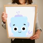 A cute robot illustration print framed for a childrens nursery decoration