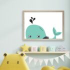 A print for newborn babies which is a light green whale illustration